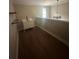 Loft area with a vanity, a sink, shelving, and wood floors at 1119 Plantation Se Dr, Conyers, GA 30094
