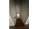 Wooden stairway leading to lower level at 1119 Plantation Se Dr, Conyers, GA 30094