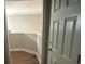 Upstairs hallway overlooking the first floor with hardwood floors at 1119 Plantation Se Dr, Conyers, GA 30094