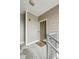 Apartment 2018 entry with tan siding, storm door, railing, and 'Sweet Home' welcome mat at 245 Amal Sw Dr # 2018, Atlanta, GA 30315