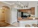 Cozy kitchen boasts stainless steel appliances, wood cabinetry, and efficient use of space at 245 Amal Sw Dr # 2018, Atlanta, GA 30315