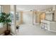 Bright living area featuring an open layout with modern finishes, neutral tones, and a view of the kitchen bar at 245 Amal Sw Dr # 2018, Atlanta, GA 30315