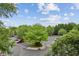 Community parking area with ample parking, lush greenery and shade trees at 245 Amal Sw Dr # 2018, Atlanta, GA 30315