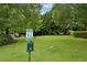 Community pet waste station area with green space, perfect for pet owners to keep area clean at 245 Amal Sw Dr # 2018, Atlanta, GA 30315