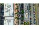 Aerial view of the building rooftops with surrounding parking and train tracks at 360 Chambers St # 405, Woodstock, GA 30188