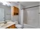 Functional bathroom features a single sink vanity and shower-tub combination, offering essential amenities at 4490 Epworth Court Ct, Powder Springs, GA 30127