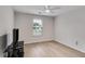 Clean bedroom with neutral colors and hardwood flooring, offering a simple, comfortable space at 4490 Epworth Court Ct, Powder Springs, GA 30127