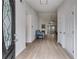 Inviting entryway with high ceilings and wood flooring leading to the spacious living areas at 4490 Epworth Court Ct, Powder Springs, GA 30127