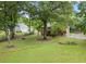 Spacious backyard with manicured lawn, perfect for outdoor activities and relaxation at 48 Saddle Field Nw Cir, Cartersville, GA 30121