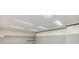 Bright basement with fluorescent lighting, unfinished walls, and cement foundation at 48 Saddle Field Nw Cir, Cartersville, GA 30121