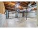 Unfinished basement with multiple garage doors and cement foundation at 48 Saddle Field Nw Cir, Cartersville, GA 30121