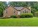 Charming single-Gathering home featuring a well-manicured front yard and cozy design at 48 Saddle Field Nw Cir, Cartersville, GA 30121