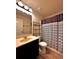 Bathroom with a vanity, toilet, and shower and tub combination at 520 Harmony Way, Locust Grove, GA 30248