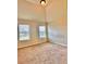 Bright bedroom with two windows allowing for plenty of natural light at 520 Harmony Way, Locust Grove, GA 30248