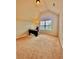 Bedroom features a large window that allows natural light to fill the room at 520 Harmony Way, Locust Grove, GA 30248