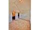 Bedroom with ensuite bathroom, neutral carpeting and a large arched ceiling at 520 Harmony Way, Locust Grove, GA 30248