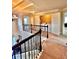 Second story hallway with laundry closet at 520 Harmony Way, Locust Grove, GA 30248