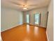 Bright bedroom with a vaulted ceiling, bamboo floors and two windows with shutter detail at 722 Beauregard Sw Dr, Marietta, GA 30064