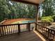 Back deck view of a fenced-in outdoor swimming pool and patio at 722 Beauregard Sw Dr, Marietta, GA 30064