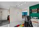 Game room with view to living room featuring a dart board at 920 Highfield Ct, Lawrenceville, GA 30043