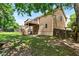 View of the house exterior from the backyard, showing the elevated wooden deck at 920 Highfield Ct, Lawrenceville, GA 30043