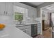 Bright and clean kitchen with quartz countertops and stainless steel appliances at 920 Highfield Ct, Lawrenceville, GA 30043