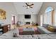Bright living room with vaulted ceiling, fireplace, and comfortable seating at 920 Highfield Ct, Lawrenceville, GA 30043
