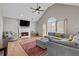 Bright living room with vaulted ceiling, fireplace, and comfortable seating at 920 Highfield Ct, Lawrenceville, GA 30043