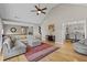 Spacious living room with vaulted ceilings, hardwood floors, and comfortable seating arrangement at 920 Highfield Ct, Lawrenceville, GA 30043