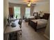 Spacious bedroom with two twin beds, two desks, ceiling fan and natural light from windows at 1130 Weatherstone Ne Dr, Atlanta, GA 30324