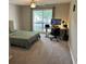 Bedroom with a large window and a desk area, perfect for a home office or study space at 1130 Weatherstone Ne Dr, Atlanta, GA 30324