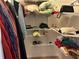 Organized walk-in closet featuring wire shelving for optimal storage of clothes and folded items at 1130 Weatherstone Ne Dr, Atlanta, GA 30324