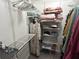 Well-organized closet with white wire shelving for maximum storage and easy access to clothes at 1130 Weatherstone Ne Dr, Atlanta, GA 30324