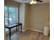 Bright dining area with plank floors and a window that provide lots of natural light at 1130 Weatherstone Ne Dr, Atlanta, GA 30324