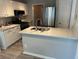 Beautiful kitchen with modern appliances, gray cabinets, and quartz countertops at 1130 Weatherstone Ne Dr, Atlanta, GA 30324