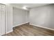 Unfinished basement featuring wood-look vinyl flooring and white baseboards at 1406 Kennesaw Nw Dr, Atlanta, GA 30318