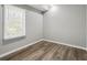 Cozy bedroom with natural light and modern flooring at 1406 Kennesaw Nw Dr, Atlanta, GA 30318