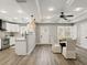 Open floor plan featuring a dining room, kitchen, and access to other living areas at 1406 Kennesaw Nw Dr, Atlanta, GA 30318