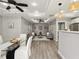 Open-concept design with neutral decor, recessed lighting, ceiling fan, and a dining area at 1406 Kennesaw Nw Dr, Atlanta, GA 30318