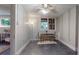 Finished basement displaying a dining area, dark-painted floors and neutral paint colors at 147 Olympic Pl, Decatur, GA 30030