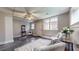 Finished basement containing new carpet, light paint colors, seating and lots of light at 147 Olympic Pl, Decatur, GA 30030
