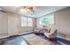 Newly finished basement displaying neutral paint colors, carpet, seating and plenty of light at 147 Olympic Pl, Decatur, GA 30030