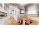 Charming dining area with hardwood floors and built in bench seating at 147 Olympic Pl, Decatur, GA 30030