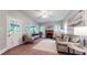 Cozy living room featuring a brick fireplace and lots of natural light at 147 Olympic Pl, Decatur, GA 30030