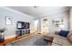 Comfortable living room with hardwood floors, stylish furniture, and abundant natural light at 147 Olympic Pl, Decatur, GA 30030
