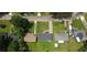 Overhead view of the home on a lot with green grass and nearby houses at 2107 Garden Cir, Decatur, GA 30032