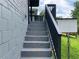 Exterior picture of block-wall staircase, handrail, and side of home at 2107 Garden Cir, Decatur, GA 30032
