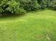A view of the large backyard lawn at 2107 Garden Cir, Decatur, GA 30032