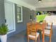 Covered carport area featuring outdoor dining set with seating for four at 2107 Garden Cir, Decatur, GA 30032