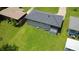 Aerial view of home's back exterior featuring a large yard and porch at 2107 Garden Cir, Decatur, GA 30032
